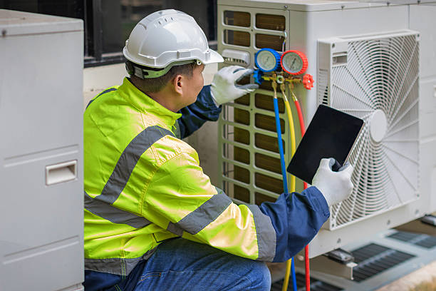 Professional Air Duct Cleaning technician working in Phillipsburg, KS